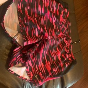 black and pink dri - fit nike shorts